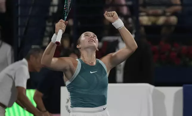Russia's Mirra Andreeva reacts after winning the Dubai Duty Free Tennis Championship final match against Denmark's Clara Tauson in Dubai, United Arab Emirates, on Saturday, Feb. 22, 2025. (AP Photo/Altaf Qadri)
