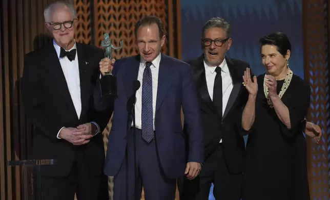 John Lithgow, from left, Ralph Fiennes, Sergio Castellitto, and Isabella Rossellini accepts the award for outstanding performance by a cast in a motion picture for "Conclave" during the 31st annual Screen Actors Guild Awards on Sunday, Feb. 23, 2025, at the Shrine Auditorium in Los Angeles. (AP Photo/Chris Pizzello)
