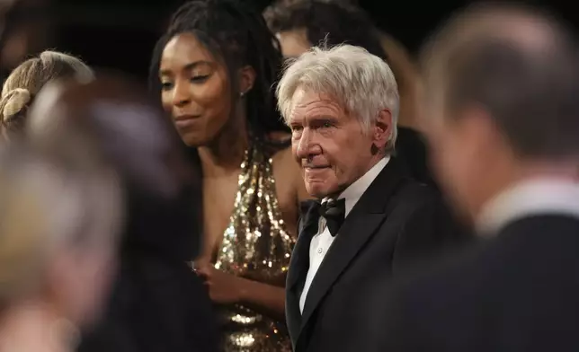 Jessica Williams, left, and Harrison Ford in the audience during the 31st annual Screen Actors Guild Awards on Sunday, Feb. 23, 2025, at the Shrine Auditorium in Los Angeles. (AP Photo/Chris Pizzello)