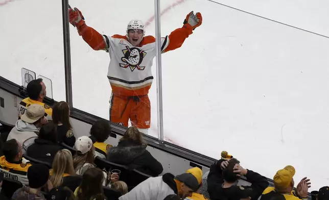 Anaheim Ducks right wing Frank Vatrano (77) celebrates after a scoring during the first period of an NHL hockey game against the Boston Bruins, Saturday, Feb. 22, 2025, in Boston. (AP Photo/Mary Schwalm)