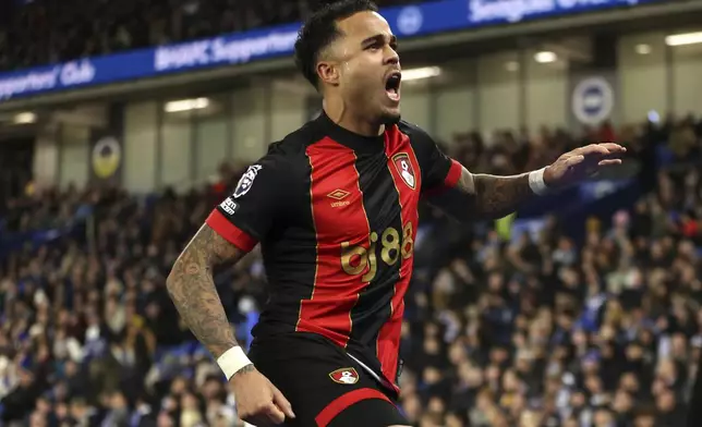 Bournemouth's Justin Kluivert celebrates scoring their side's first goal of the game during the English Premier League soccer match at American Express Stadium, Brighton, England, Tuesday, Feb. 25, 2025. (Steven Paston/PA via AP)