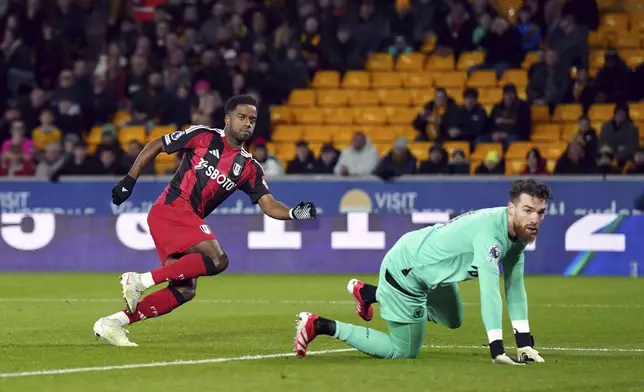 Fulham's Ryan Sessegnon scores their side's first goal of the game during the English Premier League soccer match between Wolverhampton Wanderers and Fulham at Molineux Stadium, Wolverhampton, England, Tuesday, Feb. 25, 2025. (Jacob King/PA via AP)