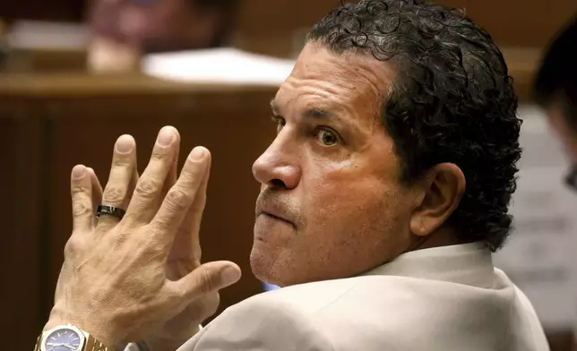 Defense attorney Joe Tacopina listens to opening remarks from the prosecuting attorney during the trial of his client, Rakim Mayers, aka A$AP Rocky, at the Clara Shortridge Foltz Criminal Justice Center in downtown Los Angeles, Friday, Jan. 24, 2025. (Genaro Molina/Los Angeles Times via AP, Pool)