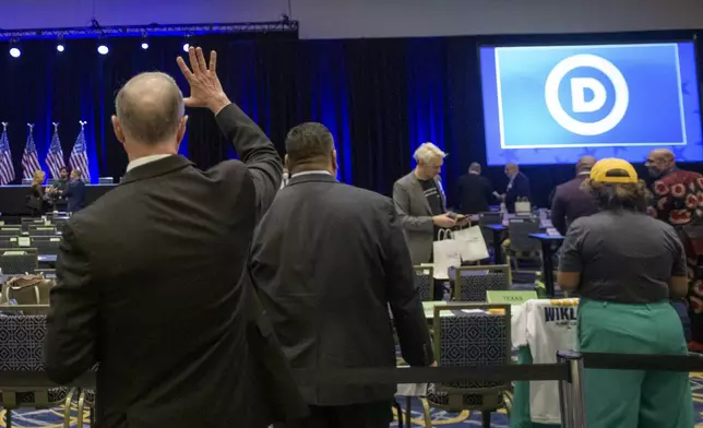 DNC chair candidate Martin O'Malley waves as he arrives at the Democratic National Committee Winter Meeting at the Gaylord National Resort and Convention Center in National Harbor, Md., Saturday, Feb. 1, 2025. (AP Photo/Rod Lamkey, Jr.)