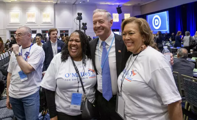 DNC chair candidate Martin O'Malley, second left, greets supporters as he arrives at the Democratic National Committee Winter Meeting at the Gaylord National Resort and Convention Center in National Harbor, Md., Saturday, Feb. 1, 2025. (AP Photo/Rod Lamkey, Jr.)