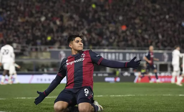 Bologna's Santiago Castro celebrates scoring during the Serie A soccer match between Bologna FC and A.C. Milan at Renato Dall'Ara Stadium, Bologna, Italy, Thursday, Feb. 27, 2025. (Massimo Paolone/LaPresse via AP)