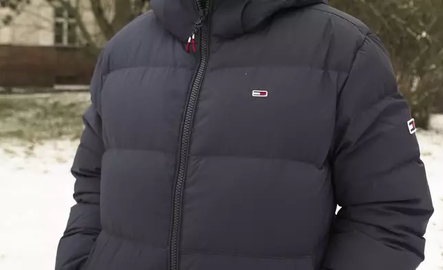 Hassan Salameh, 40 years old, coming to Germany in 2014 from Syria, pose for a photo during an interview with the Associated Press, in Berlin, Germany, Thursday, Feb. 13, 2025. (AP Photo/Pietro De Cristofaro)
