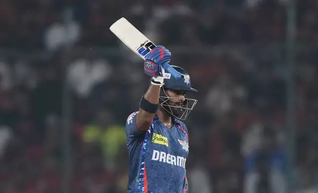 Lucknow Super Giants' Nicholas Pooran celebrates after scoring fifty runs during the Indian Premier League cricket match between Sunrisers Hyderabad and Lucknow Super Giants at Rajiv Gandhi International Cricket Stadium in Hyderabad, India, Thursday, March 27, 2025. (AP Photo/Mahesh Kumar A.)