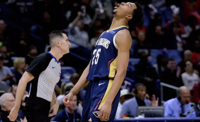 New Orleans Pelicans guard Trey Murphy III (25) celebrates after a 3-point basket against the Houston Rockets during the first half of an NBA basketball game in New Orleans, Thursday, March 6, 2025. (AP Photo/Matthew Hinton)