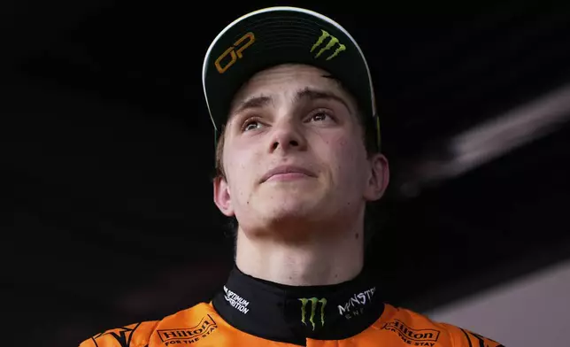 McLaren driver Oscar Piastri of Australia reacts following his second place finish in qualifying at the Australian Formula One Grand Prix at Albert Park, in Melbourne, Australia, Saturday, March 15, 2025. (AP Photo/Asanka Brendon Ratnayake)
