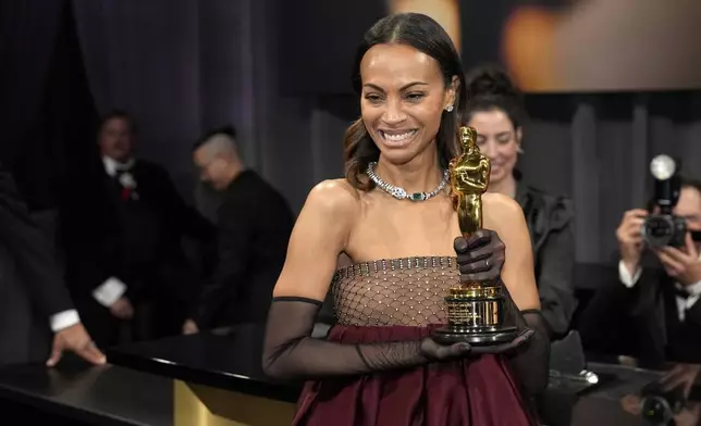 Zoe Saldana, winner of the award for best performance by an actress in a supporting role for "Emilia Perez," attends the Governors Ball after the Oscars on Sunday, March 2, 2025, in Los Angeles. (AP Photo/John Locher)