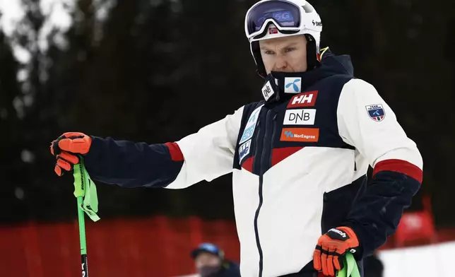 Norway's Henrik Kristoffersen concentrates ahead of an alpine ski, men's World Cup Giant Slalom, in Hafjell, Norway, Saturday, March 15, 2025. (AP Photo/Gabriele Facciotti)