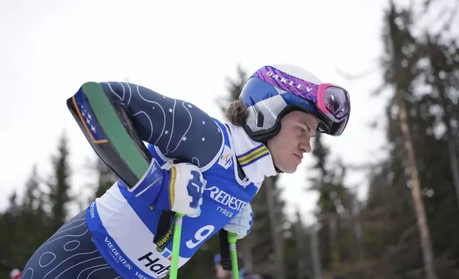 Brazil's Lucas Pinheiro Braathen concentrates ahead of an alpine ski, men's World Cup Giant Slalom, in Hafjell, Norway, Saturday, March 15, 2025. (AP Photo/Giovanni Zenoni)