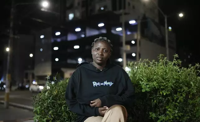 Isha Len, a migrant of Cameroon, poses for a photo in Panama City, Monday, March 10, 2025, after being deported from the U.S., detained for weeks in a Panamanian immigration camp, and released on a temporary humanitarian visa allowing a 30‑day stay. (AP Photo/Matias Delacroix)