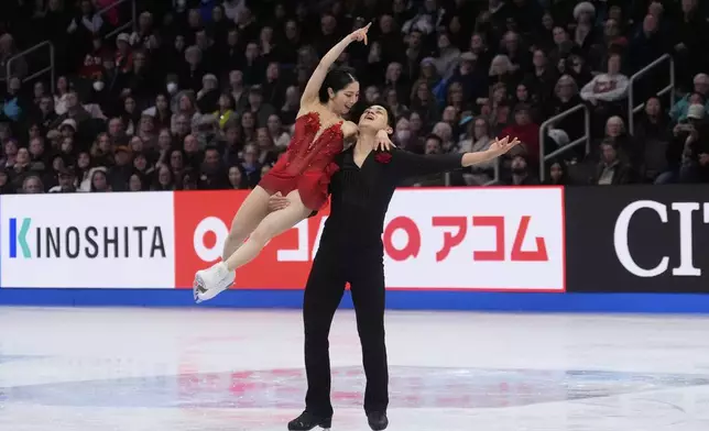 Riku Miura and Ryuichi Kihara, of Japan, perform during the pairs free skating program at the figure skating world championships, Thursday, March 27, 2025, in Boston. (AP Photo/Charles Krupa)