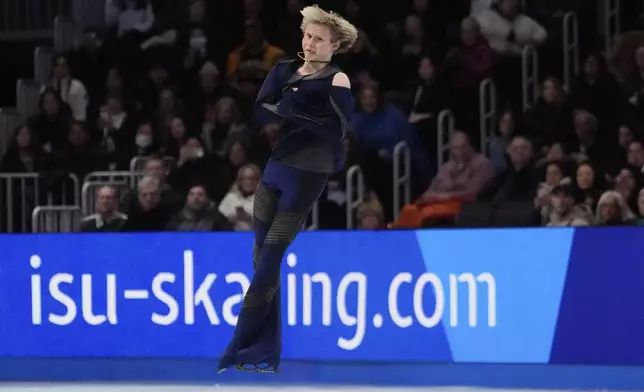 Ilia Malinin, of the United States, skates during the men's short program at the figure skating world championships, Thursday, March 27, 2025, in Boston. (AP Photo/Charles Krupa)