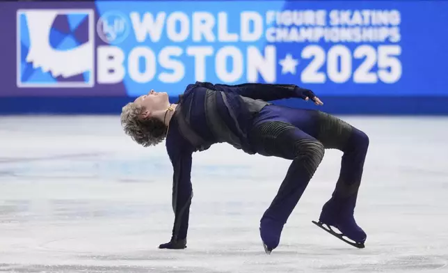 Ilia Malinin, of the United States, skates during the men's short program at the figure skating world championships, Thursday, March 27, 2025, in Boston. (AP Photo/Charles Krupa)