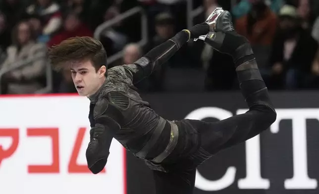 Mikhail Shaidorov, of Kazakhstan, skates during the men's short program at the figure skating world championships, Thursday, March 27, 2025, in Boston. (AP Photo/Charles Krupa)
