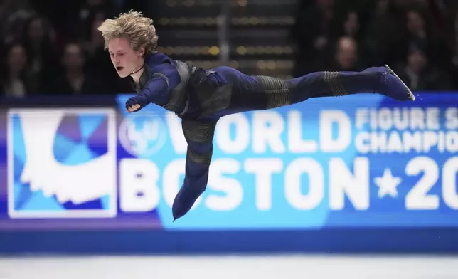 Ilia Malinin, of the United States, skates during the men's short program at the figure skating world championships, Thursday, March 27, 2025, in Boston. (AP Photo/Charles Krupa)