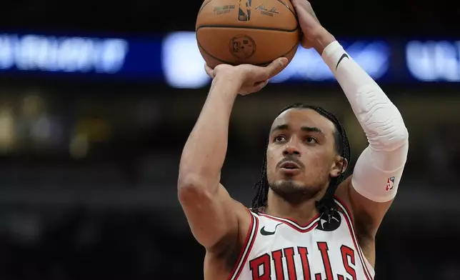 Chicago Bulls guard Tre Jones takes a free throw during the first half of an NBA basketball game against the Toronto Raptors, Friday, Feb. 28, 2025, in Chicago. (AP Photo/Erin Hooley)