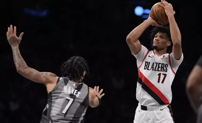 Portland Trail Blazers' Shaedon Sharpe (17) shoots over Brooklyn Nets' Killian Hayes (7) during the first half of an NBA basketball game Friday, Feb. 28, 2025, in New York. (AP Photo/Frank Franklin II)