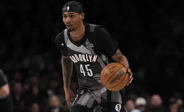 Brooklyn Nets' Keon Johnson (45) looks to pass during the second half of an NBA basketball game against the Portland Trail Blazers Friday, Feb. 28, 2025, in New York. (AP Photo/Frank Franklin II)