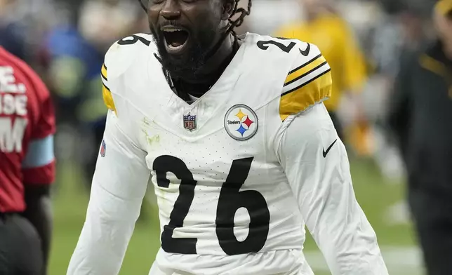FILE - Pittsburgh Steelers cornerback Donte Jackson (26) celebrates after an NFL football game against the Las Vegas Raiders in Las Vegas, Sunday, Oct. 13, 2024. (AP Photo/John Locher,File)