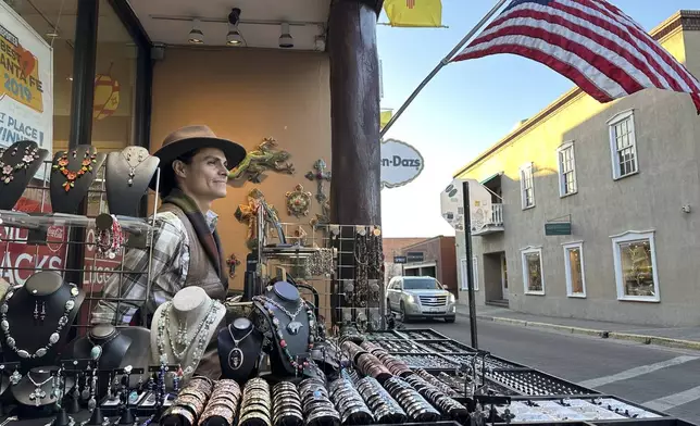 Gabriel Garcia sells jewellry from a coveted vending spot near the historic Santa Fe Plaza in Santa Fe, New Mexico, on Thursday, Feb. 27, 2025. (AP Photo/Susan Montoya Bryan)