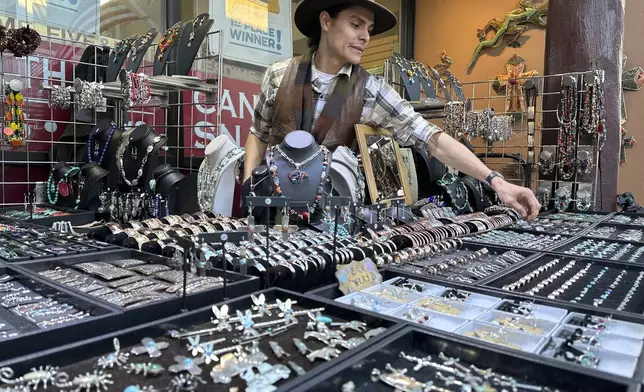 Gabriel Garcia sells jewellry from a coveted vending spot near the historic Santa Fe Plaza in Santa Fe, New Mexico, on Thursday, Feb. 27, 2025. (AP Photo/Susan Montoya Bryan)