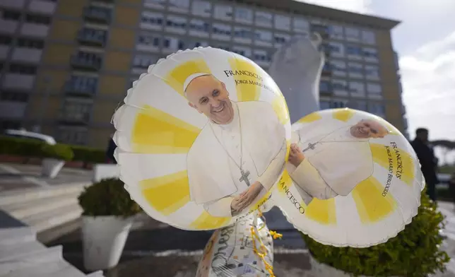 Ballons for Pope Francis are seen at the Agostino Gemelli Polyclinic, in Rome, Wednesday, Feb. 26, 2025, where the Pontiff is hospitalized since Friday, Feb. 14. (AP Photo/Andrew Medichini)