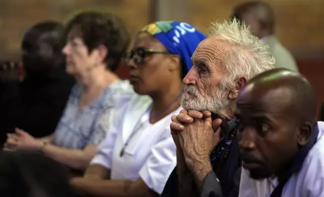 Faithful attend a spiritual celebration praying for the health of Pope Francis, at The Cathedral of Christ the King in Johannesburg, South Africa, Sunday, March 2, 2025. (AP Photo/Themba Hadebe)