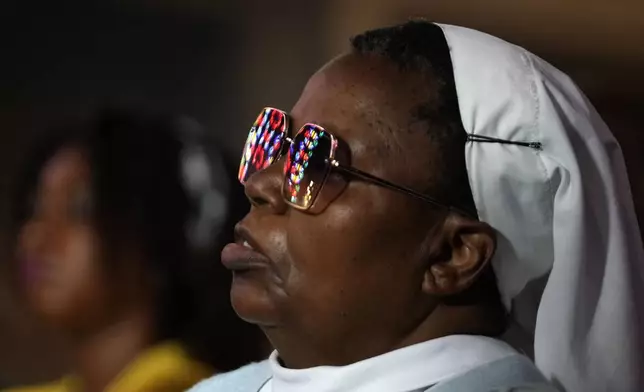A nun ul attends a spiritual celebration praying for the health of Pope Francis, at The Cathedral of Christ the King in Johannesburg, South Africa, Sunday, March 2, 2025. (AP Photo/Themba Hadebe)