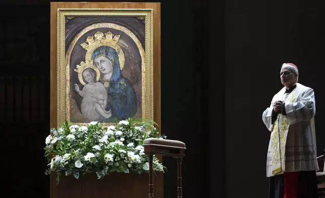 Cardinal Robert Francis Prevost, Prefect of the Dicastery for Bishops, leads the recitation of the Holy Rosary for Pope Francis' health in St Peter's Square at the Vatican, Monday, March 3, 2025. (AP Photo/Kirsty Wigglesworth)