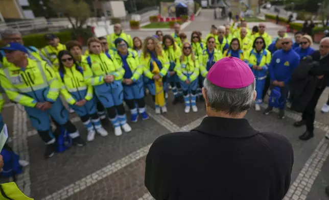 Bishop Franco Agostinelli leads a rosary prayer for Pope Francis in front of the Agostino Gemelli Polyclinic, in Rome, Saturday, March 8, 2025, where the Pontiff is hospitalized since Friday, Feb. 14. (AP Photo/Andrew Medichini)
