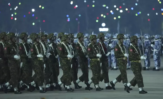 Myanmar military officers march during a parade to commemorate Myanmar's 80th Armed Forces Day, in Naypyitaw, Myanmar, Thursday, March 27, 2025. (AP Photo/Aung Shine Oo)