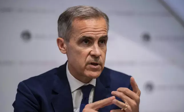 FILE - Governor of the Bank of England, Mark Carney, speaks during the Bank of England interest rate decision and inflation report press conference at the Bank of England in London, Thursday, Aug. 1, 2019. (Chris J Ratcliffe/Pool Photo via AP, File)