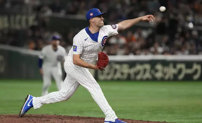 Chicago Cubs pitcher Matthew Boyd throws to the Yomiuri Giants in the sixth inning of an MLB Japan Series exhibition baseball game in Tokyo, Japan, Sunday, March 16, 2025. (AP Photo/Eugene Hoshiko)