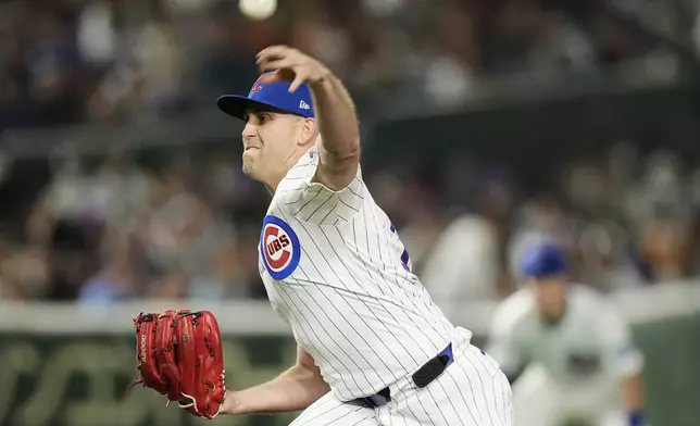 Chicago Cubs' Matthew Boyd throws to the Yomiuri Giants in the sixth inning of an MLB Japan Series exhibition baseball game in Tokyo, Japan, Sunday, March 16, 2025. (AP Photo/Hiro Komae)