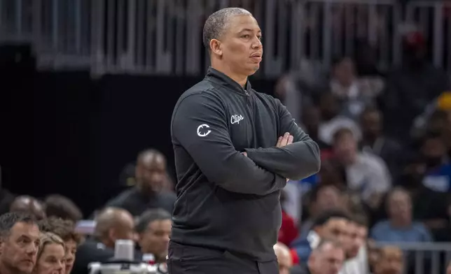 Los Angeles Clippers head coach Tyronn Lue stands on the court during the first half of an NBA basketball game against the Atlanta Hawks, Friday, March 14, 2025, in Atlanta. (AP Photo/Erik Rank)