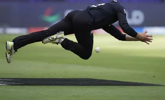 New Zealand's Will Young fails to take the catch after a shot played by India's Shreyas Iyer during the ICC Champions Trophy cricket match between India and New Zealand at Dubai International Cricket Stadium in Dubai, United Arab Emirates, Sunday, March 2, 2025. (AP Photo/Altaf Qadri)