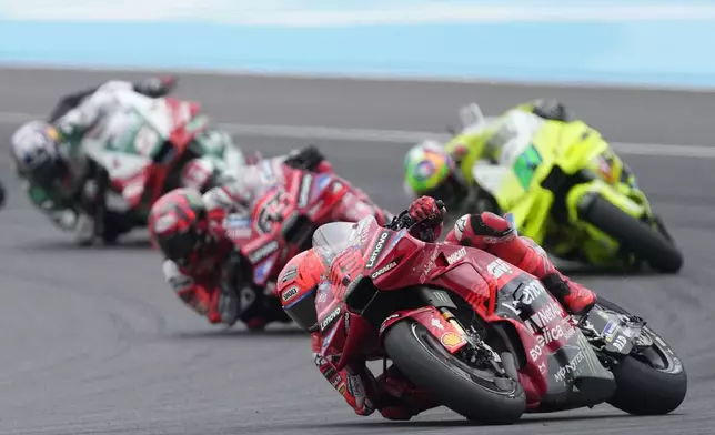 Spain's Marc Marquez of the Ducati Lenovo Team competes during the Moto GP race in Termas de Rio Hondo circuit, Argentina, Sunday, March 16, 2025. (AP Photo/Gustavo Garello)