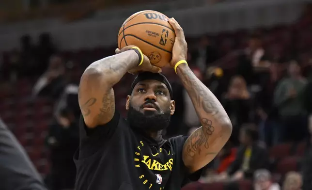 Los Angeles Lakers' LeBron James shoots around before an NBA basketball game against the Chicago Bulls, Thursday, March 27, 2025, in Chicago. (AP Photo/Paul Beaty)