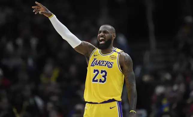 Los Angeles Lakers' LeBron James (23) yells to teammates during the first half of an NBA basketball game against the Chicago Bulls Thursday, March 27, 2025, in Chicago. (AP Photo/Paul Beaty)