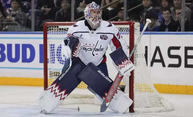 Washington Capitals goaltender Charlie Lindgren (79) protects the net during the first period of an NHL hockey game against the New York Rangers Wednesday, March 5, 2025, in New York. (AP Photo/Frank Franklin II)