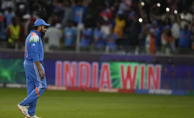 India's captain Rohit Sharma after they won the ICC Champions Trophy cricket match between against New Zealand at Dubai International Cricket Stadium in Dubai, United Arab Emirates, Sunday, March 2, 2025. (AP Photo/Altaf Qadri )
