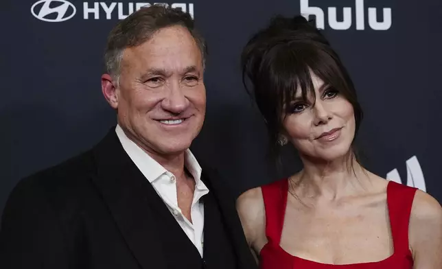 Terry Dubrow, left, and Heather Dubrow arrive at the 36th annual GLAAD Media Awards on Thursday March 27, 2025, at the Beverly Hilton Hotel in Beverly Hills, Calif. (Photo by Jordan Strauss/Invision/AP)