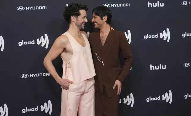 Michael Urie, left, and Mark Indelicato arrive at the 36th annual GLAAD Media Awards on Thursday March 27, 2025, at the Beverly Hilton Hotel in Beverly Hills, Calif. (Photo by Jordan Strauss/Invision/AP)