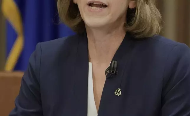 Wisconsin Supreme Court candidate Susan Crawford participates in a debate against Brad Schimel, Wednesday, March 12, 2025, in Milwaukee. (AP Photo/Morry Gash)