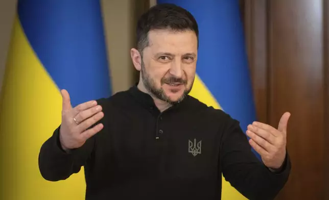 Ukrainian President Volodymyr Zelenskyy speaks during a briefing in Kyiv, Ukraine, Wednesday, March 12, 2025. (AP Photo/Efrem Lukatsky)