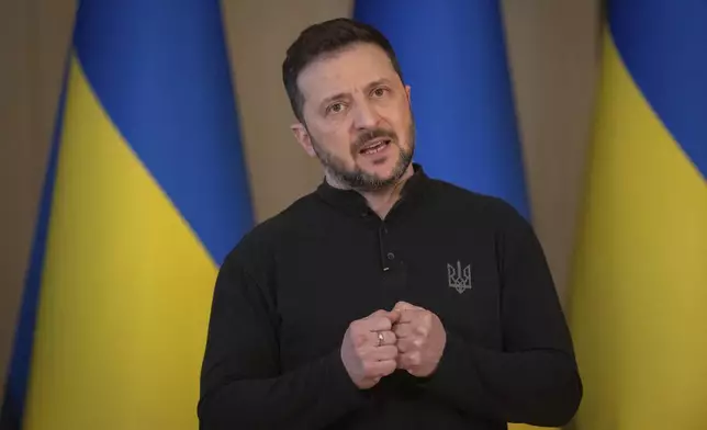 Ukrainian President Volodymyr Zelenskyy speaks during the briefing in Kyiv, Ukraine, Wednesday, March 12, 2025. (AP Photo/Efrem Lukatsky)